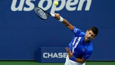 Novak Djokovic will 'probably' miss Australian Open, won't be 'blackmailed' over vax status, father says