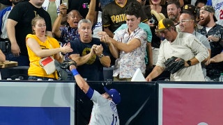 Dodgers' AJ Pollock steals home run from Padres' Manny Machado