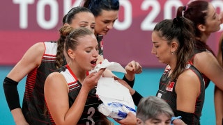 Olympic volleyball players crash heads in horrifying scene