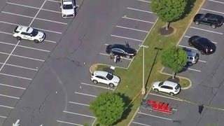 At least 1 killed after gunfire erupts outside Target store, police say