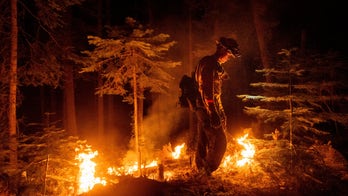 Wildfire crews move closer to containing massive blazes, but other problems persist