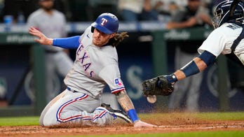 Rangers rally twice over Mariners, snap 14-game road skid