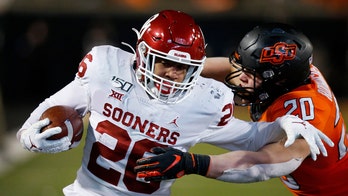 Oklahoma RB Brooks back after sitting with COVID-19 concerns