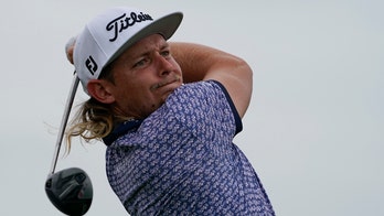 Sputtering Rahm, superb Smith share lead at Northern Trust