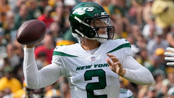 Wilson throws 2 TD passes as Jets beat Packers 23-14