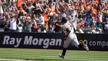 Solano's pinch-hit, 2-run homer rallies Giants past A's