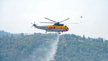 Firefighters work to keep California fire from Lake Tahoe