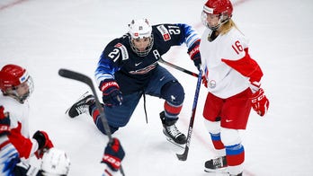 Knight sets women's world hockey scoring record in US win