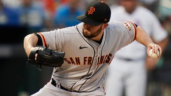 Giants' Cueto out with cold, Wood tests positive for virus