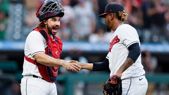 Indians get obstruction call in 8th, rally past Red Sox 7-5