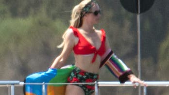 Paris Hilton soaks up some sun on yacht in Sardinia with fiancé Carter Reum