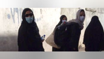 Afghan women react to Taliban allowing girls back in school as fears persist for their safety