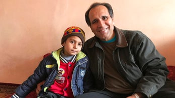US families adopting Afghan children are trying to get them out of the country