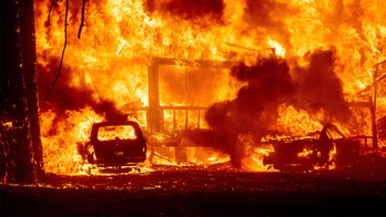 Largest wildfire moves near California city, fueled by winds