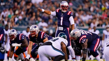 Newton, Jones star at QB for Patriots in 35-0 rout of Eagles