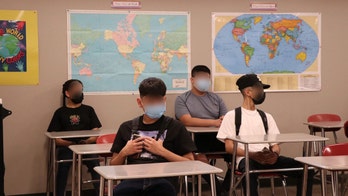 Arizona biology teacher sues district over student mask mandate