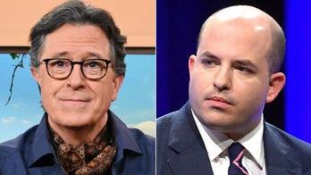 Brian Stelter roasted as ‘tongue-wagging company man’ for defense of CNN, Cuomo after Colbert pressed him