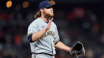Burnes pitches Brewers by Giants in matchup of NL contenders