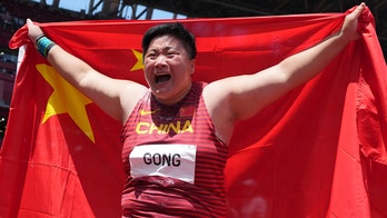 China's Gong Lijiao quizzed by state media over plans for 'woman's life,' described as 'manly woman'