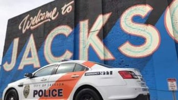 Mississippi police officer shot, rushed to hospital for surgery, suspect turns himself in at church