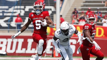 Haener, Fresno St. dismantle UConn 45-0 in sweltering heat