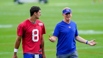 Giants' Jason Garrett asks reporters to call him 'coach,' writes 'fight' on his shirt