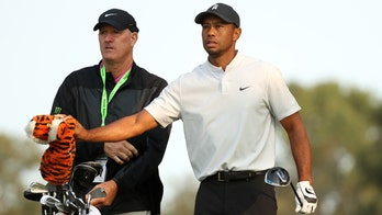 Tiger Woods' caddie will carry the bag for different golfer