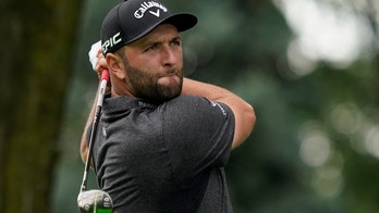 Thomas, Rahm open with 63s to share lead at Liberty National