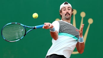 Umpire holds back Jordan Thompson in wild tennis scene: 'Call the police'