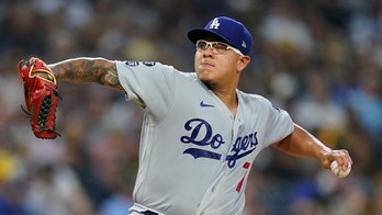 Pollock, Urías lead Dodgers past slumping Padres 5-2