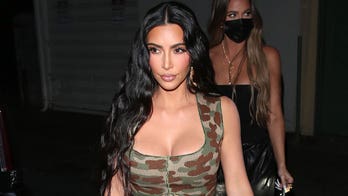Kim Kardashian turns heads in New York City with black, leather dominatrix-style outfit ahead of the Met Gala