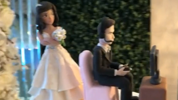 Couple speaks out after video game-themed wedding cake topper unexpectedly goes viral