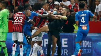 Nice-Marseille Ligue 1 match under review following chaos between players, fans