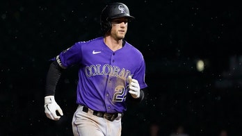 McMahon goes deep in 10th, Rox split long twinbill with Cubs