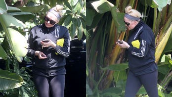 Erika Jayne goes for a workout while memorabilia is auctioned to pay for estranged husband's bankruptcy case