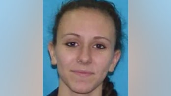 Rhode Island woman, 24, held after video shows mom, 35, with child beaten in road rage incident: report