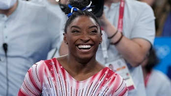 Simone Biles fans cheer on gymnast as she wins bronze medal