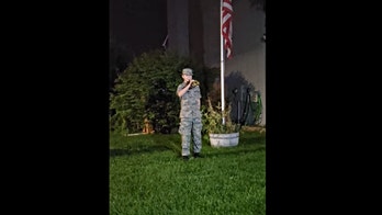 Nevada boy, 14, plays Taps with US flag at half-staff to honor fallen service members in Afghanistan
