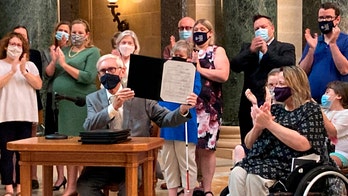 Wisconsin governor vetoes GOP bills to restrict absentee ballots