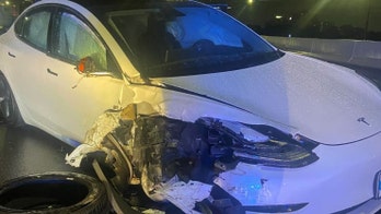 Tesla on Autopilot crashes into parked police car in Orlando