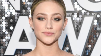 'Riverdale' star Lili Reinhart models 'Shrek-colored' bikini on balcony