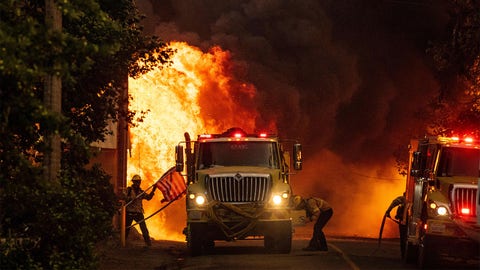 California firefighter saves US flag just feet away from flames of Dixie Fire