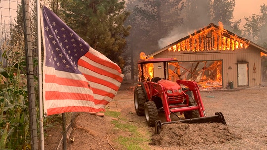 Western wildfires threaten thousands of homes, strain resources