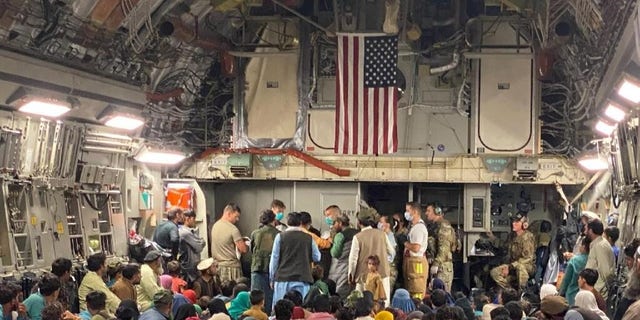 A 315th Airlift Wing aircrew from Joint Base Charleston, South Carolina helped to deliver a baby aboard a C-17 Globemaster III carrying vulnerable Afghans evacuated from Afghanistan, Aug. 23, moments before landing at a Middle East staging area. (U.S. Air Force courtesy photo)