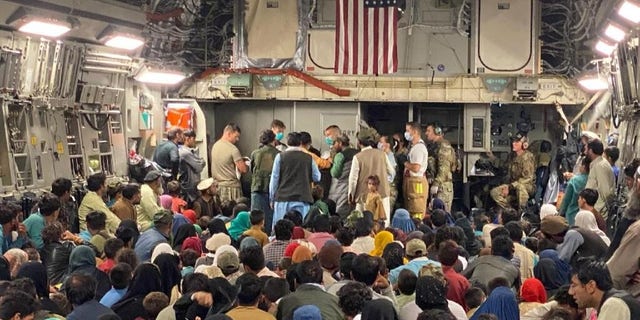 A 315th Airlift Wing aircrew from Joint Base Charleston, South Carolina helped to deliver a baby aboard a C-17 Globemaster III carrying vulnerable Afghans evacuated from Afghanistan, Aug. 23, moments before landing at a Middle East staging area. (U.S. Air Force courtesy photo)