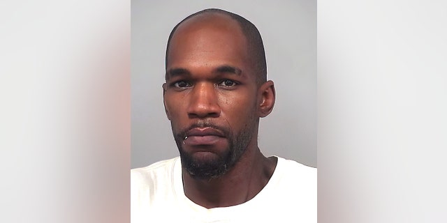 Micquel Deandre Gay is charged with making terrorist threats, possession of firearms by a convicted felon and conducting criminal gang activity.