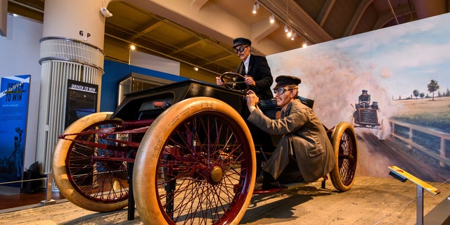 This image shows the "Sweepstakes" car, part of a Driven To Win exhibit at The Henry Ford Museum in Dearborn, Mich. 