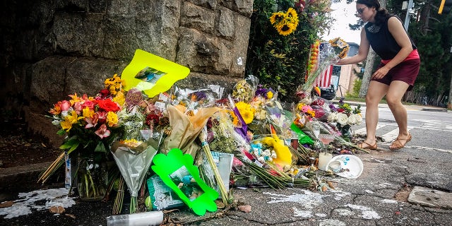 A makeshift memorial to Katherine Janness is seen at the entrance to Piedmont Park on Sunday, Aug. 1, 2021, in Atlanta. (Associated Press)