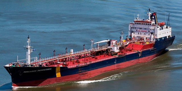 In this June 14, 2012 photo, the ship that would later become the Asphalt Princess sails through Quebec City, Canada. The hijackers who captured the Asphalt Princess off the coast of the United Arab Emirates in the Gulf of Oman departed the targeted ship on Wednesday, Aug. 4, 2021, the British navy reported, as recorded radio traffic appeared to reveal a crew member onboard saying Iranian gunmen had stormed the asphalt tanker.