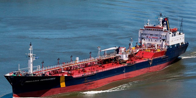 In this June 14, 2012 photo, the ship that would later become the Asphalt Princess sails through Quebec City, Canada. The hijackers who captured the Asphalt Princess off the coast of the United Arab Emirates in the Gulf of Oman departed the targeted ship on Wednesday, Aug. 4, 2021, the British navy reported, as recorded radio traffic appeared to reveal a crew member onboard saying Iranian gunmen had stormed the asphalt tanker.